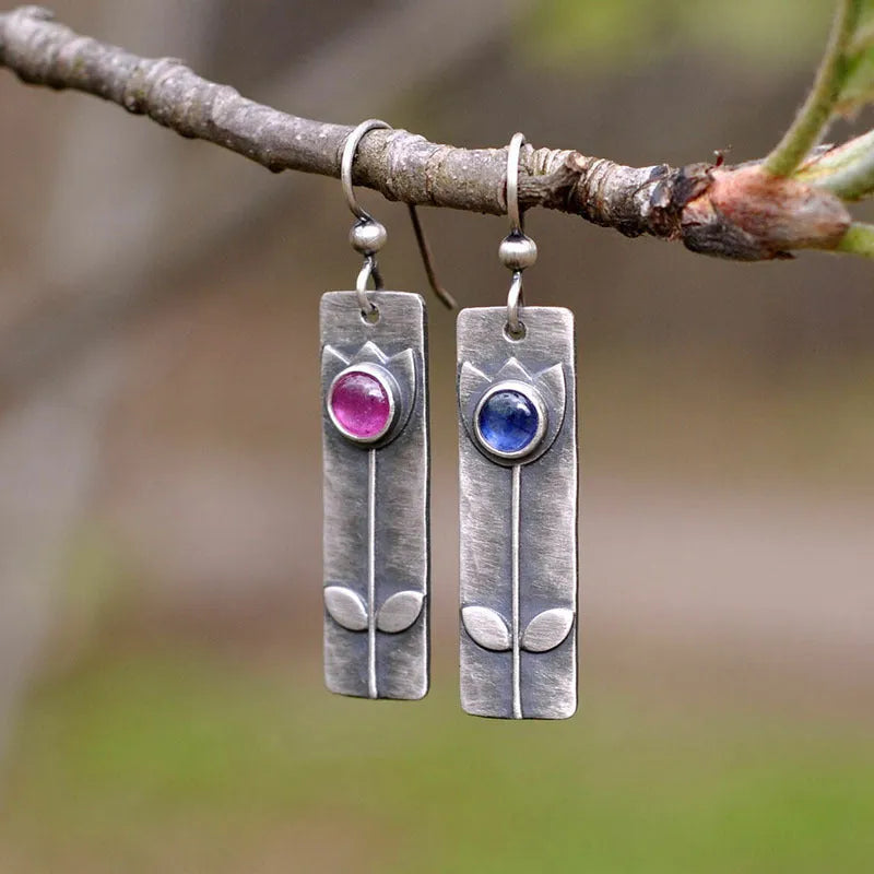 Antique finish geometric earrings with 8mm oval red sapphire centre stone on sterling silver