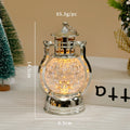 Creative retro-style small oil lamp LED night light in gold or silver finish on a table.
