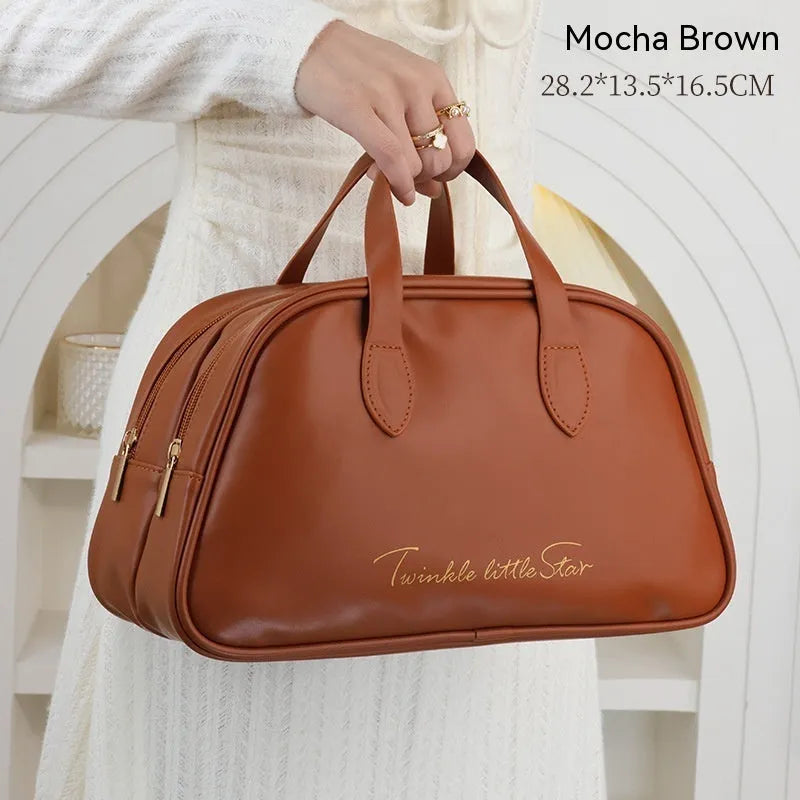 Leather travel toiletry bag with dry-wet separation compartments in caramel mocha colour