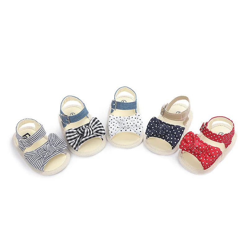 White and Black Velcro fastening low-top toddler shoes for sizes 11cm, 12cm, and 13cm.