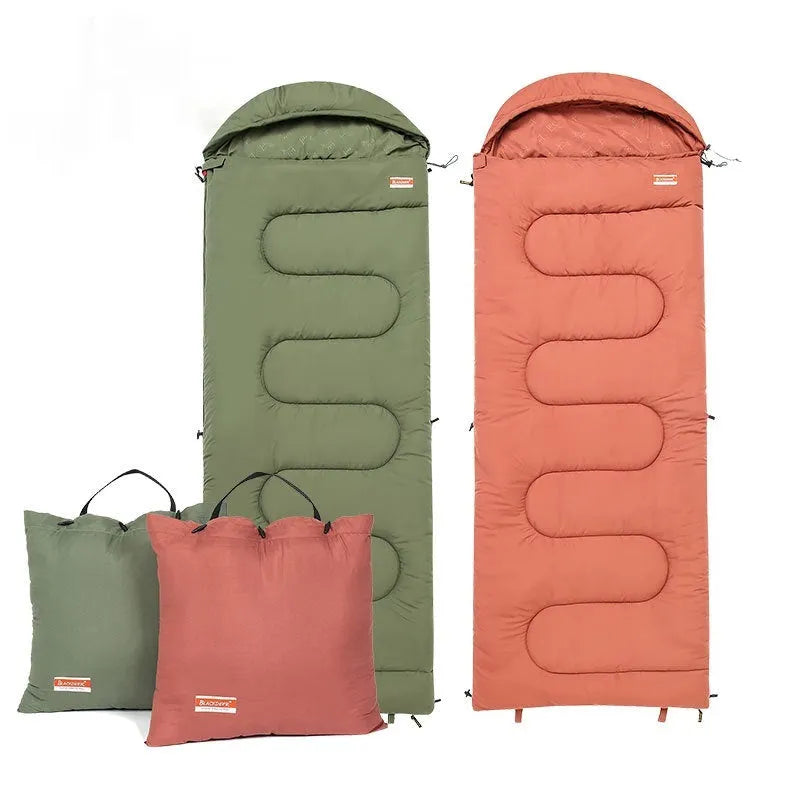 Ochre and olive green cotton sleeping bag with 300g/m² fill, packed to 40cm x 20cm for camping
