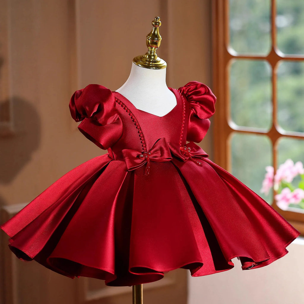 Girls wine red polyester princess party dress for birthdays and evening events, available in 80cm to 150cm height sizes.