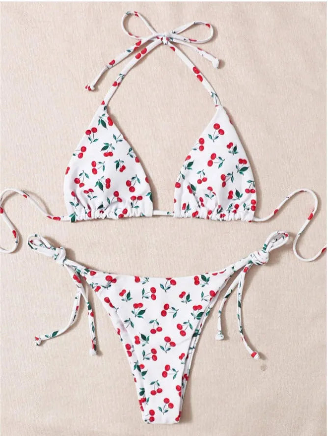 Solid colour women's halter bikini set with briefs and backless design.