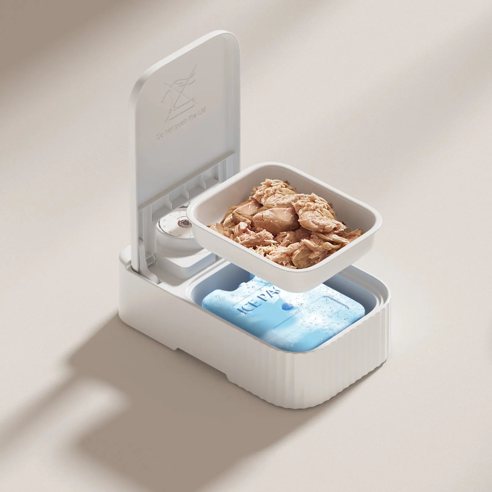 White automated pet feeder with timer display and a removable ice crystal cooling box underneath.