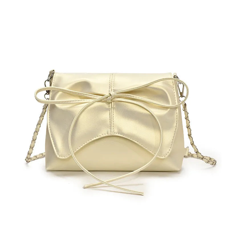 Women's black crossbody underarm bag with horizontal square shape and sewing line detailing