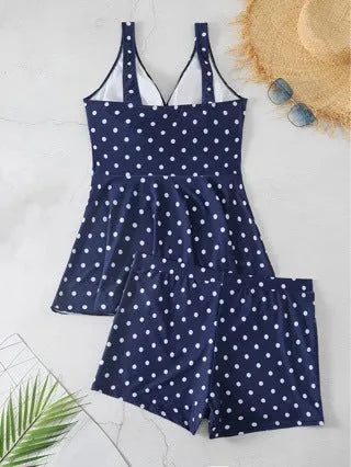 Women's blue polka dot plus size bikini with skirted briefs and matching top