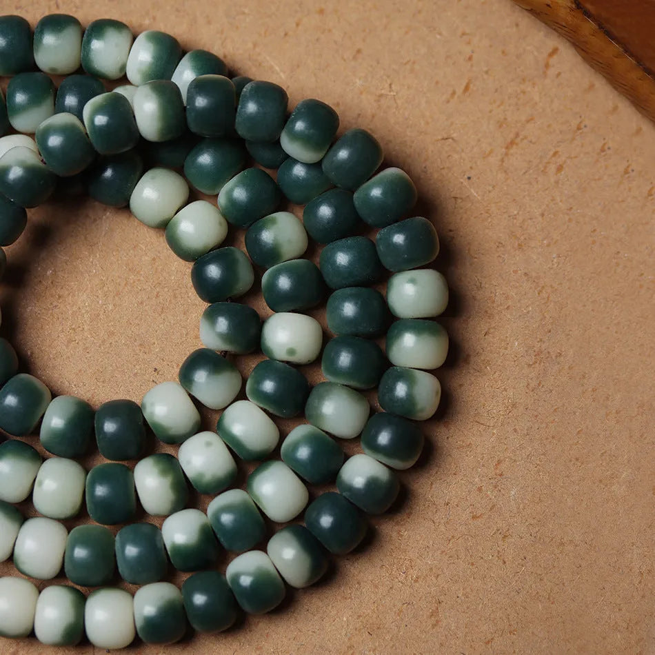 Lotus white jade bodhi beads bracelet with carved floral patterns on 8mm jade beads