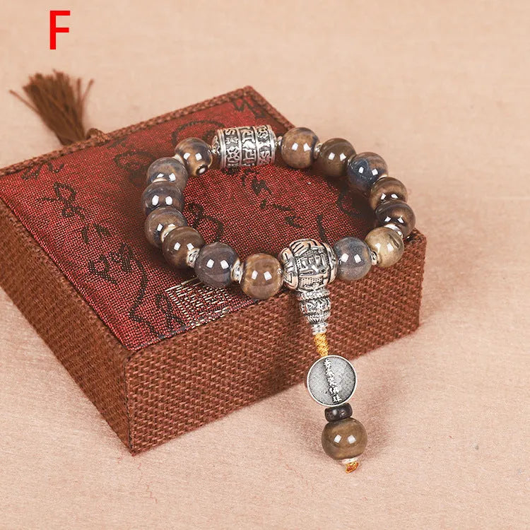 Men's gradient ceramic chain bracelet in coloured glaze, polished finish, showing colour variation.