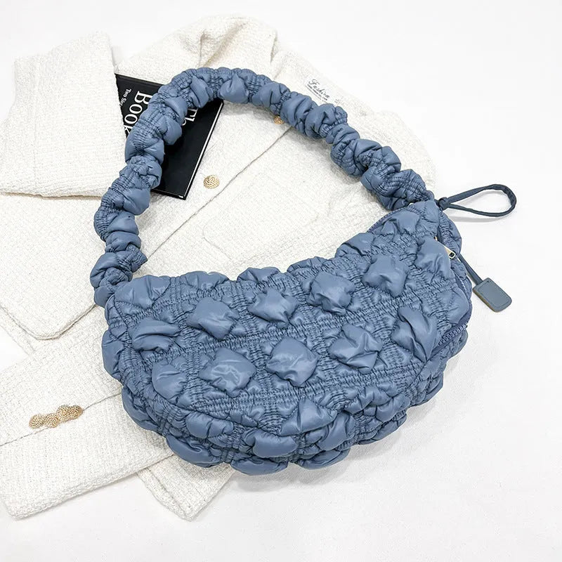 Women's nylon underarm bag in beige colour showing 35cm width and adjustable 120cm shoulder strap
