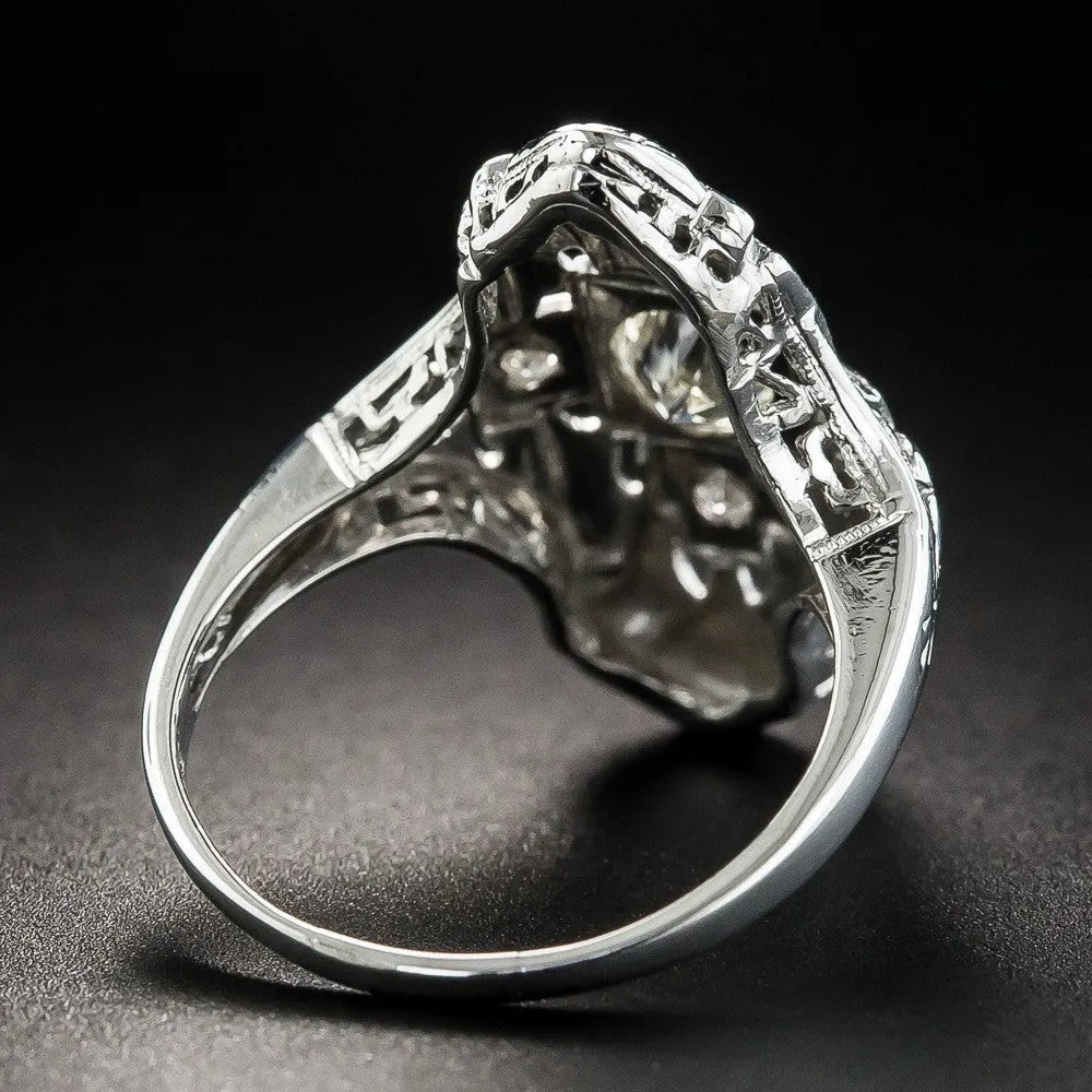 Silver electroplated hollow geometric diamond-studded ring showing negative space band design