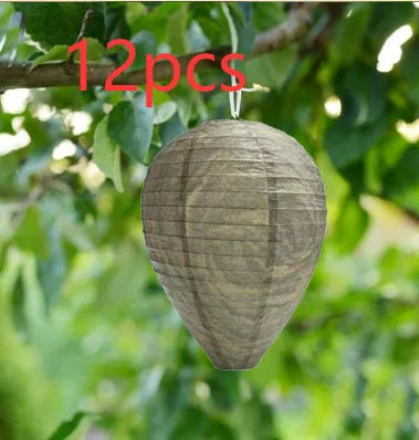 Hexagonal beehive lantern measuring 22cm by 28cm, made of paper and wire, weighing 30g.
