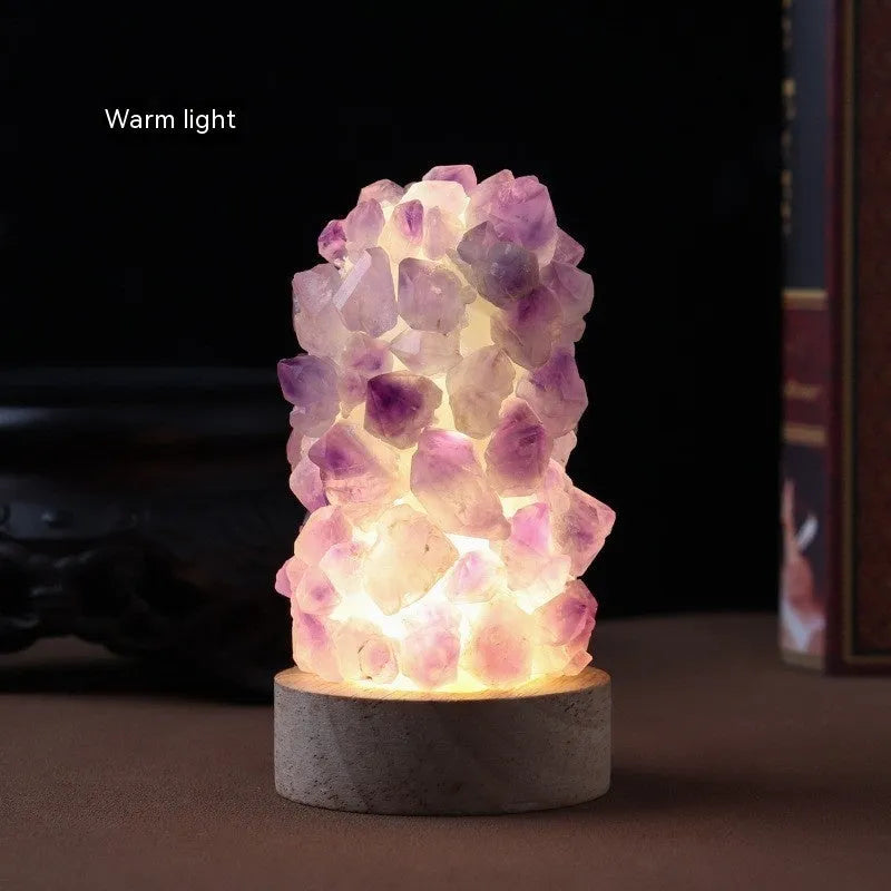 Mini amethyst crystal night light with USB cable, showing natural purple colour and crystalline tooth flower structure.