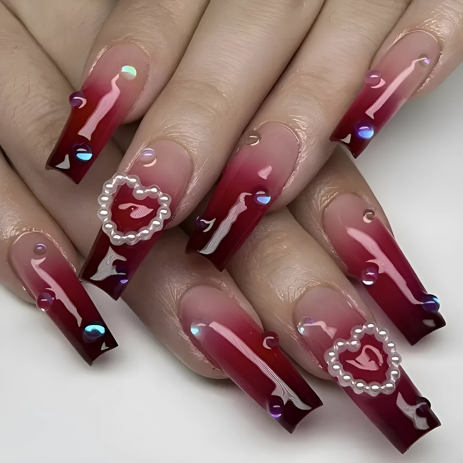 Wine red gradient fake nail tips with plaid heart pattern in long ballet shape