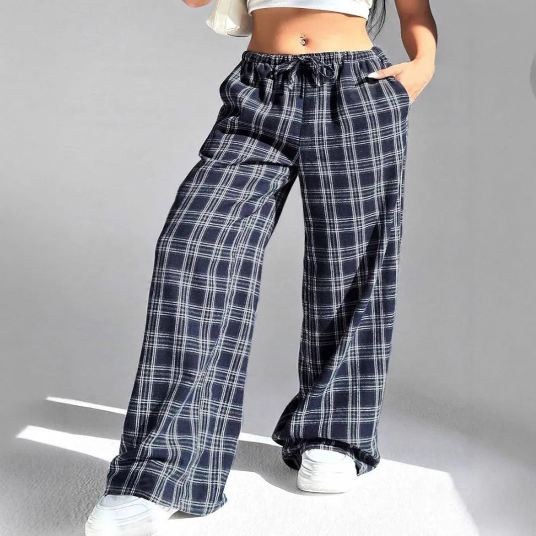 Women's plaid trousers with drawstring waist and pockets in blue and red colours