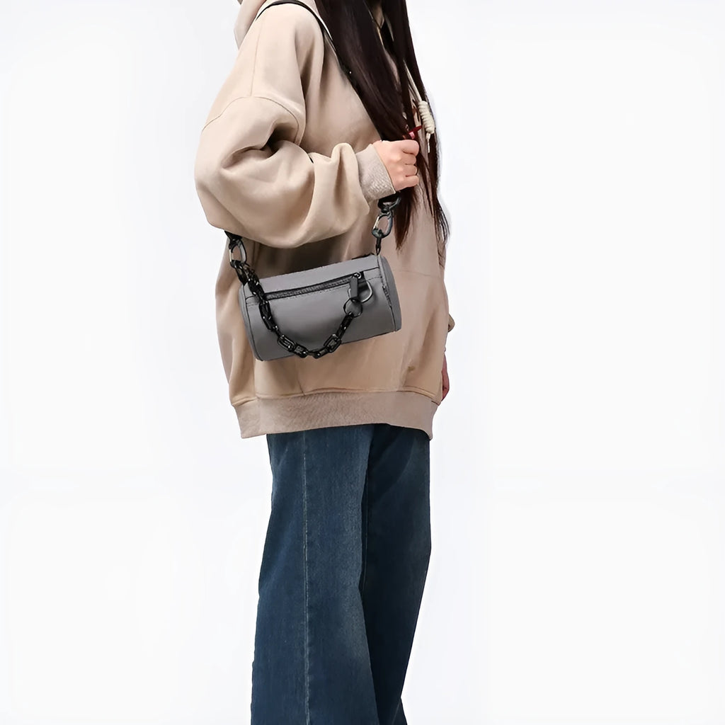 Casual messenger bag in Oxford cloth with chain detail and single-shoulder strap