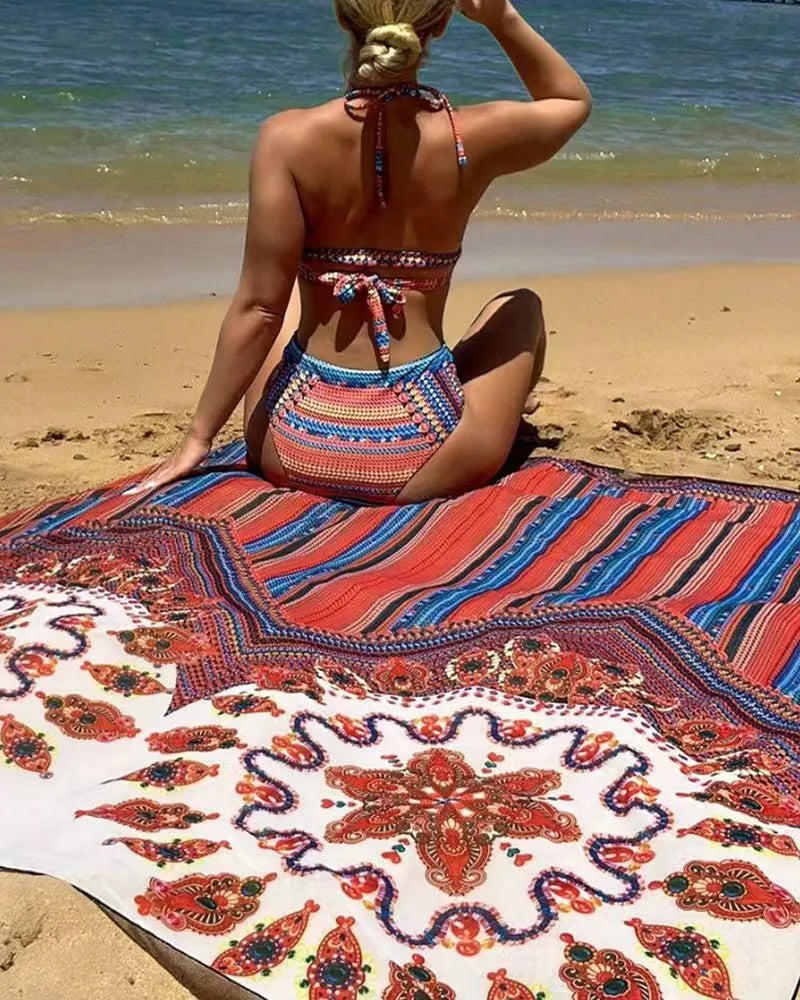 Women's three-piece swimsuit set with cutout blouse, high-waist pants, and coordinating coat in polyester fabric