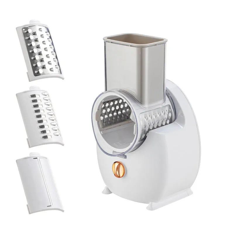 White electric vegetable slicer with rotary grater mechanism and suction base on kitchen counter