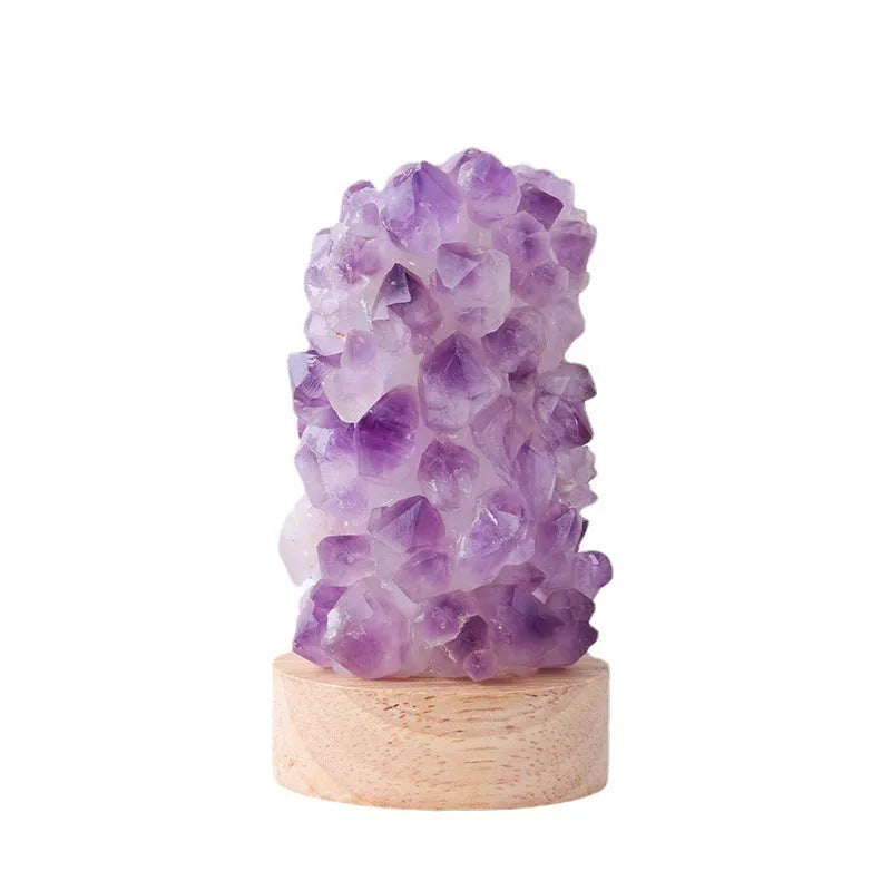 Mini amethyst crystal night light with USB cable, showing natural purple colour and crystalline tooth flower structure.
