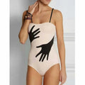 Women's one-piece bikini with attached gauze skirt for swimming and wading, made from polyester fibre.