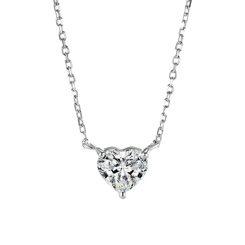 Simple silver-coloured women's necklace with a small love heart pendant on a chain.