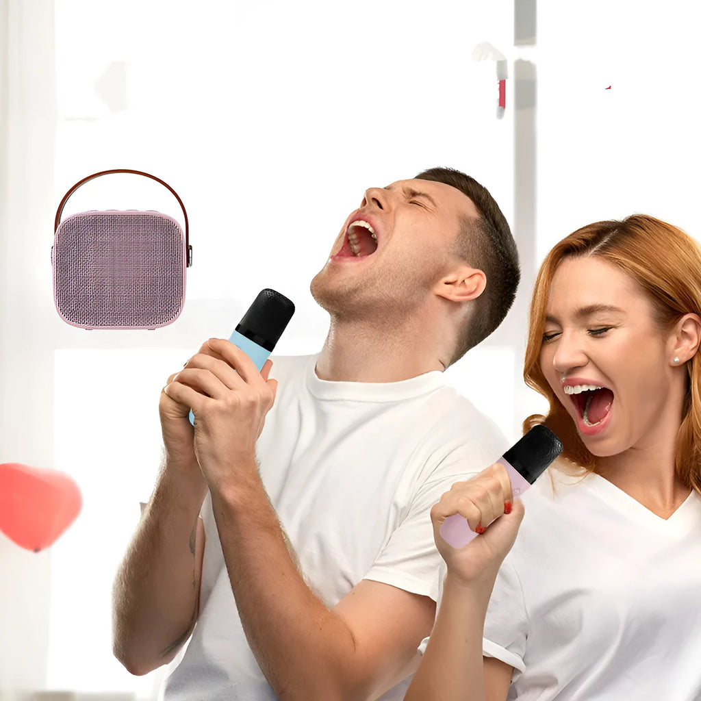 Compact white, pink, or blue portable Bluetooth speaker with USB charging cable.