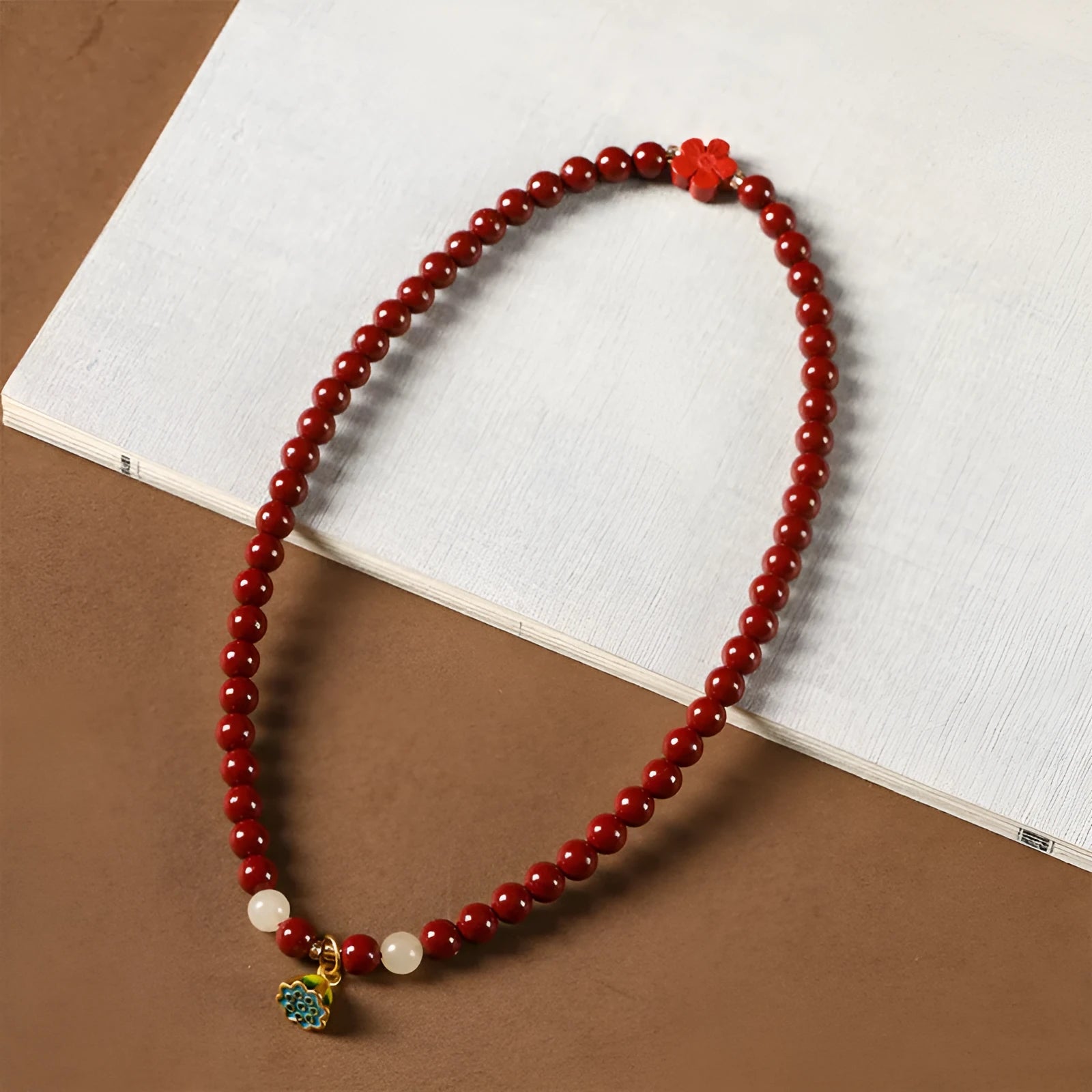 Hand-woven purple gold sand double circle bracelet with a 6mm lotus seedpod bead.