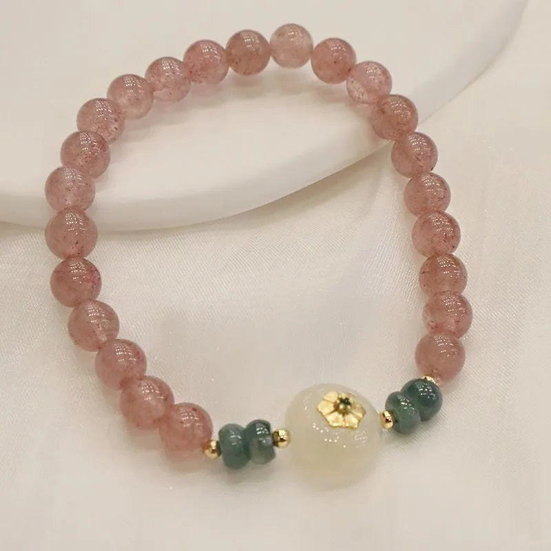 Women's strawberry quartz bracelet with blue water emerald pendant and peace buckle clasp