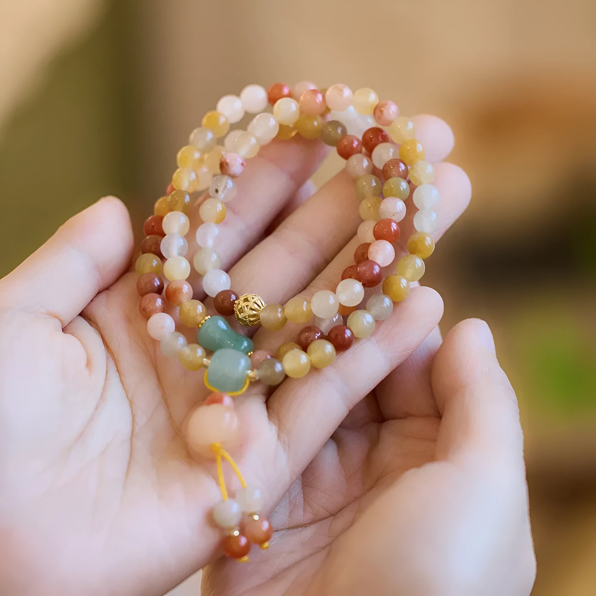 Women's three-circle pumpkin tassel jade bracelet with Jinsi Jade stones and handcrafted construction