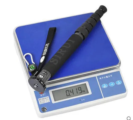 Black carbon fibre monopod for SLR cameras showing telescopic sections extended to 1540mm maximum height