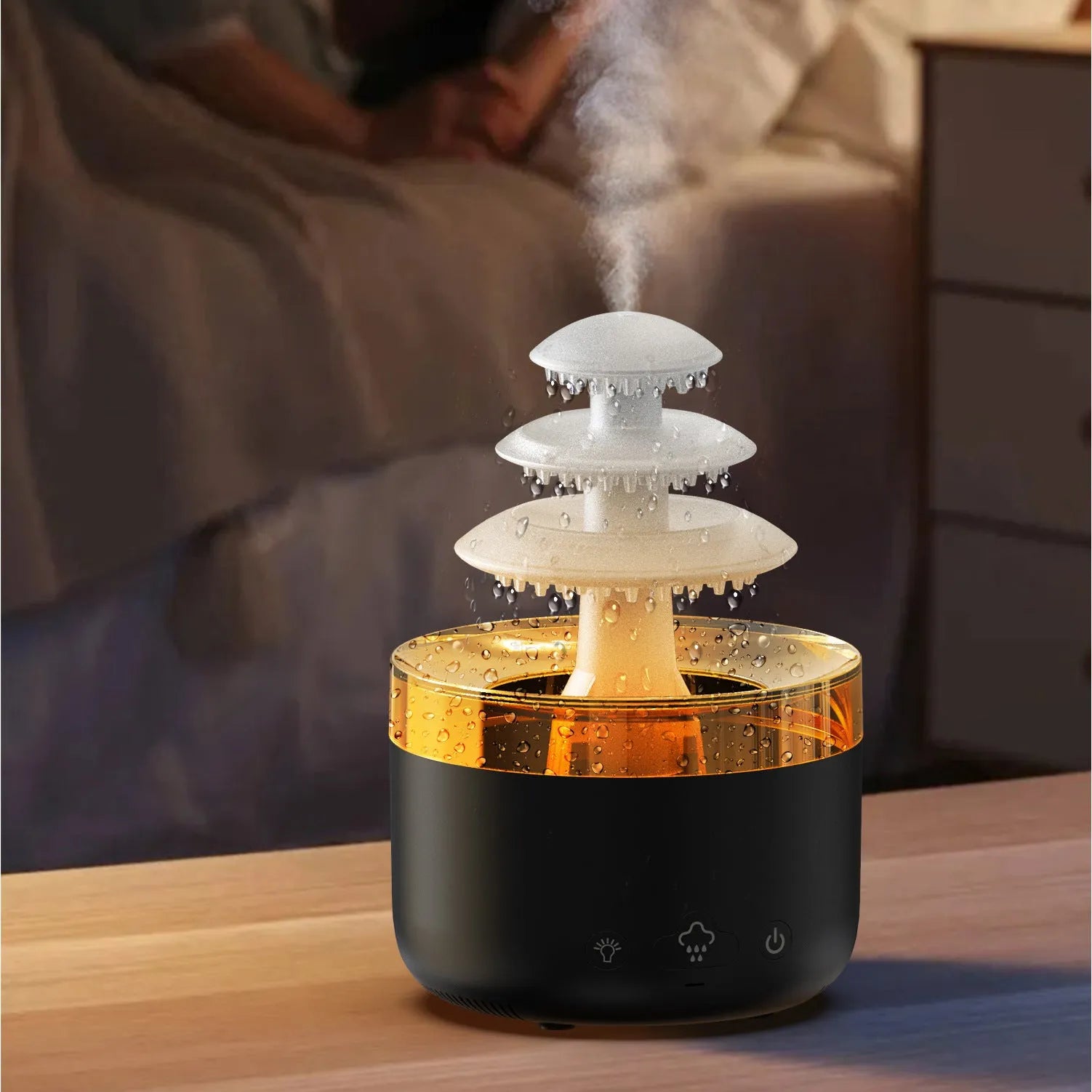 White Cloud Rain ultrasonic humidifier and essential oil diffuser with colourful LED lights on a table.