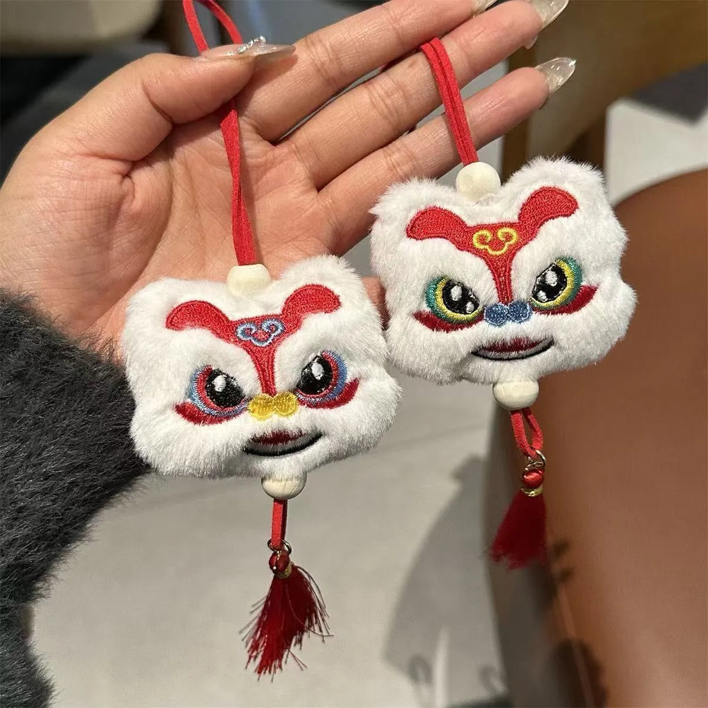 Handmade blue plush lion keychain ornament with star stone accent and embroidered cartoon features