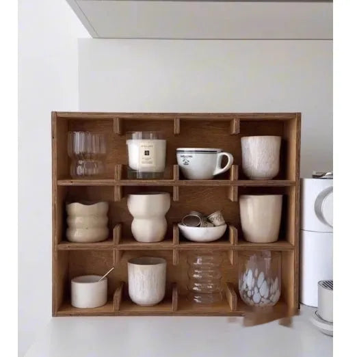 Solid birch wood cup storage rack with multiple grid compartments in meridian colour finish