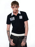 Black slim fit men's polo shirt with short sleeves and embroidery hat design detail