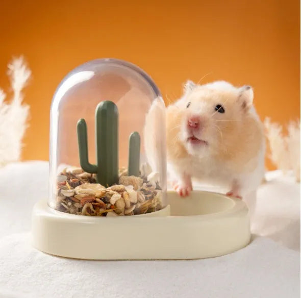 Automatic hamster feeder with transparent food chamber in vanilla yellow colour
