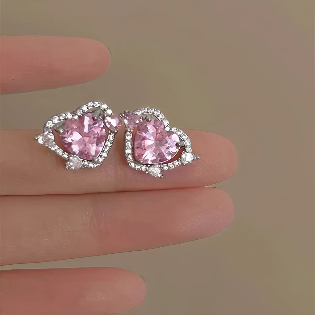Women's white gold tone heart stud earrings with electroplated copper construction