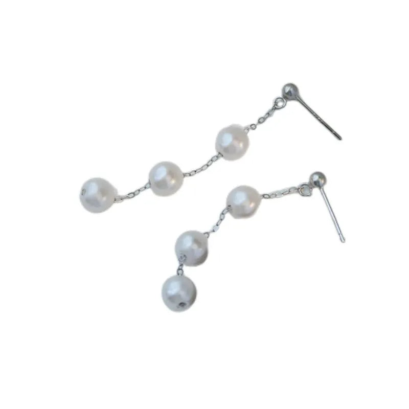 Long star fringe earrings for women in 925 silver with gold or white gold electroplated finish and U-shaped design