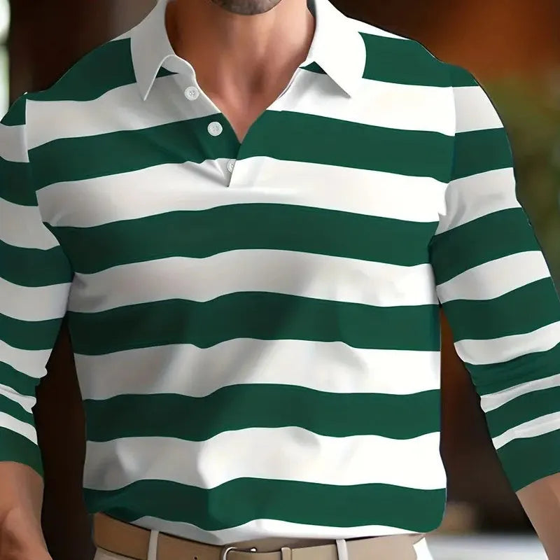 Man wearing a loose-fitting retro style long sleeve pullover top in a solid colour.