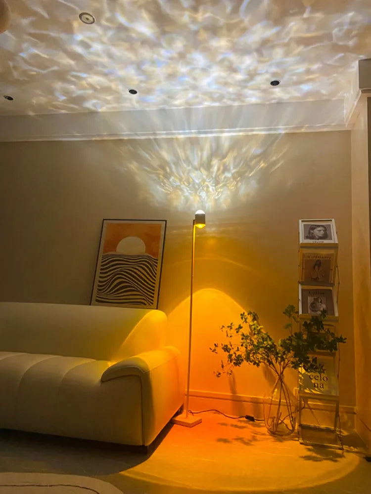 Sunset red floor lamp projecting a water wave light pattern on a living room floor.