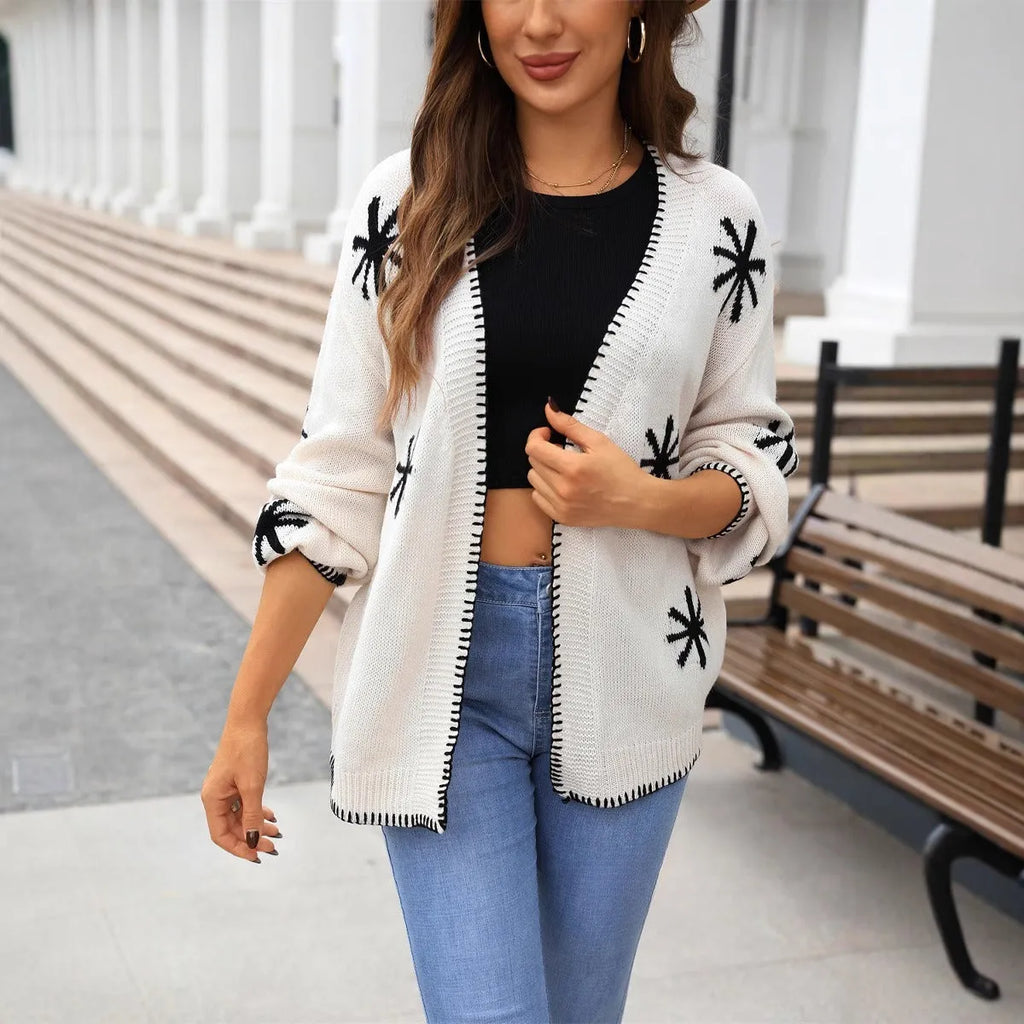 Women's jacquard knitted coat with floral pattern in beige and orange colours, loose fit cardigan design