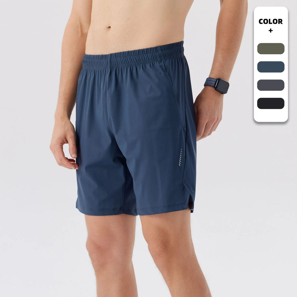 Man wearing black ice silk sports shorts, showing mid-waist fit and shorts length.