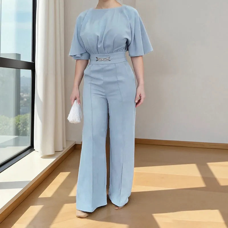 Blue casual suit with long sleeves and trousers, made from polyester fabric, available in sizes S to 3XL.