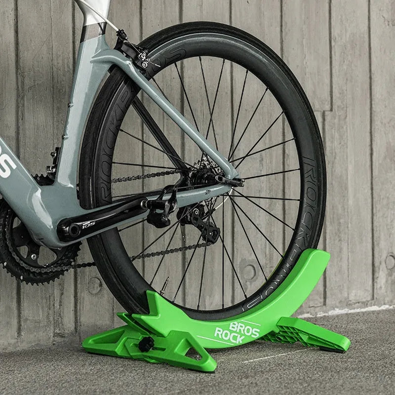 Black ABS plastic bicycle parking rack holder mounted on wall