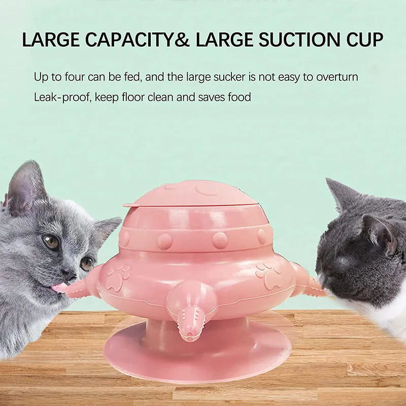 Pink silicone pet milk feeder with pacifier on a flat base, for puppies and kittens.