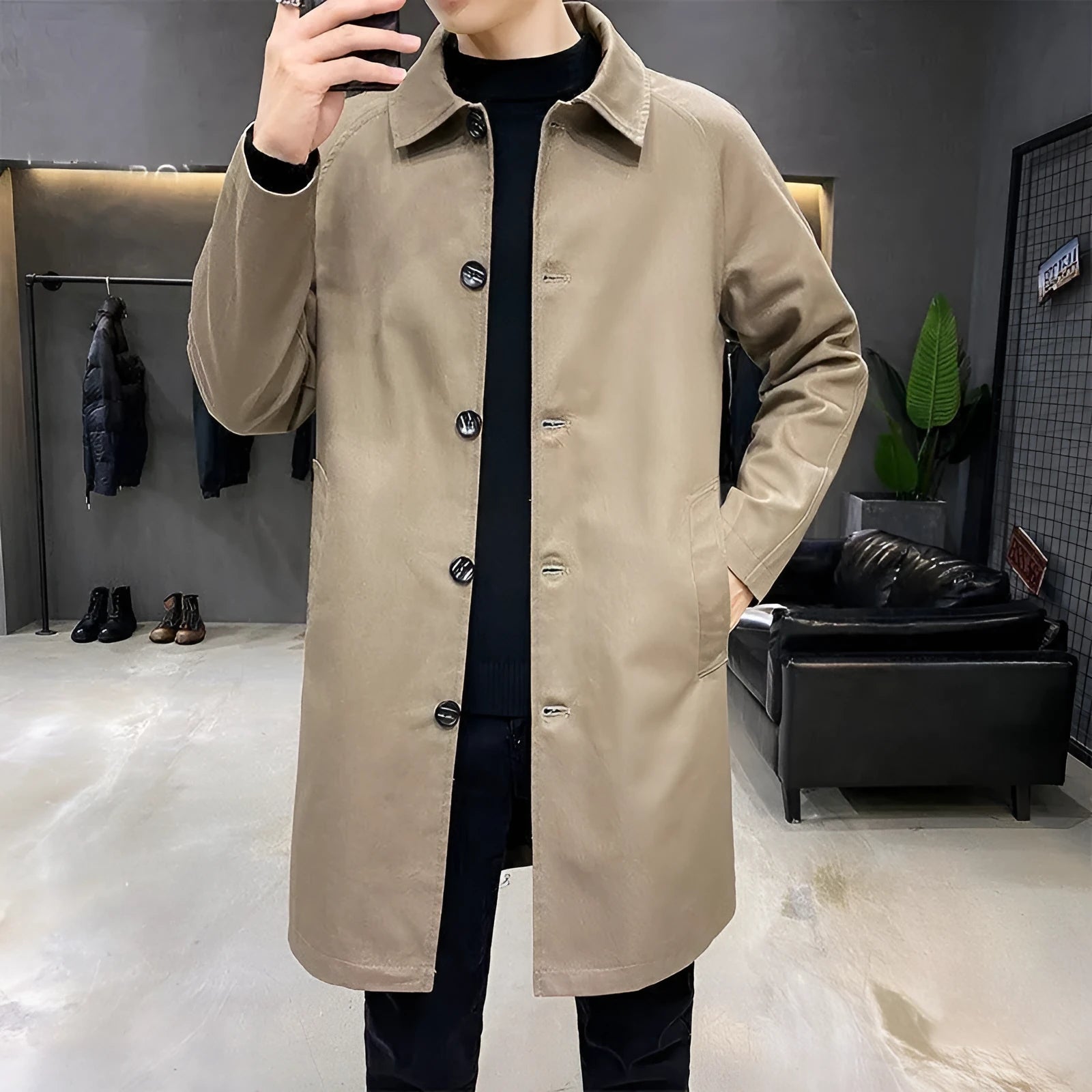 Men's khaki trench coat with loose casual fit and mid-length design