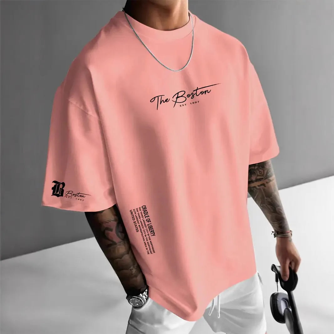 Men's loose letter print short sleeve t-shirt in polyester, round neck pullover, available in white black coral apricot.