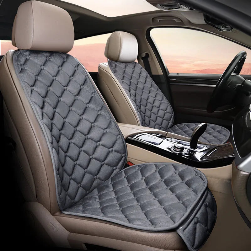 Cotton car seat cushion in burgundy colour on vehicle seat