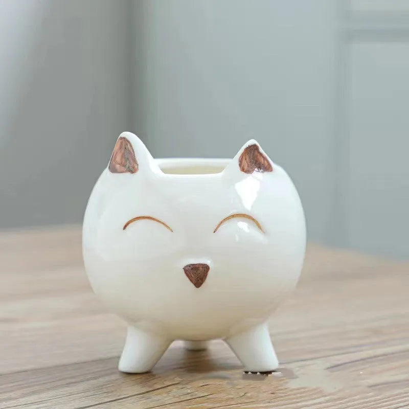 Ceramic succulent flowerpot with hand-painted cartoon animal and floral design in pastel colour