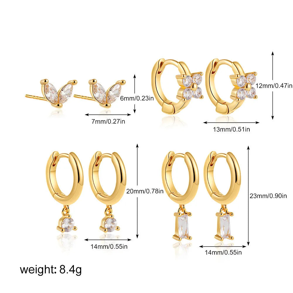 Copper geometric earrings set with electroplated gold finish showing star, ellipse, ring, and quadrilateral designs