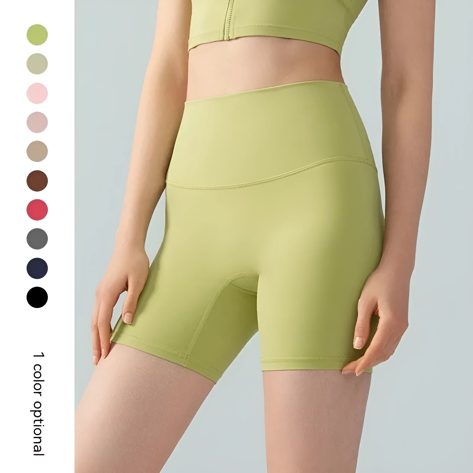 Women's high-waisted lycra yoga shorts in leaf green for fitness.
