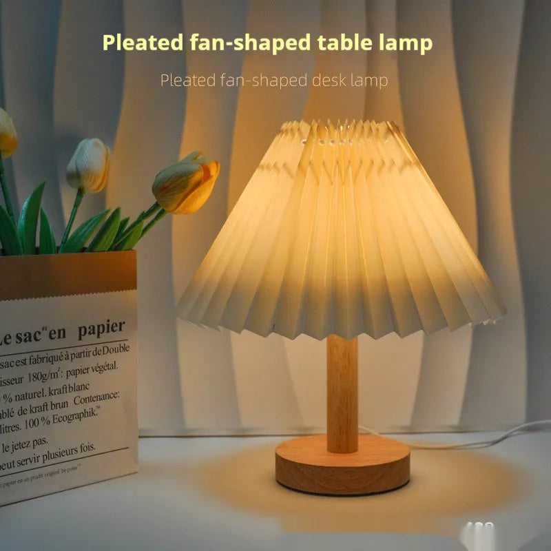 Vintage pleated umbrella-shaped bedside lamp with remote control on bedside table